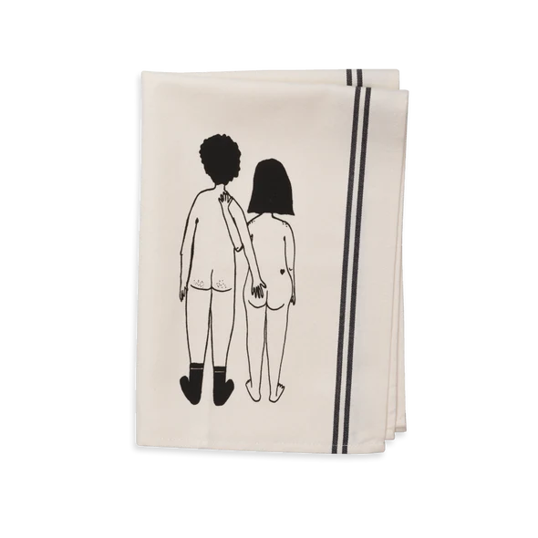 The Couple Tea Towel – Front is a folded white tea towel with black stripes and a minimalist black line drawing of two nude people, reflecting unique Estonian design—ideal for Tallinn shopping enthusiasts. Gate21.ee