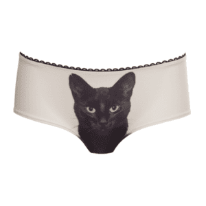 Black Cat Knickers: Beige women’s underwear featuring a black cat face with striking green eyes below a scalloped black waistband. A playful Estonian design, ideal for gift shops. Gate21.ee