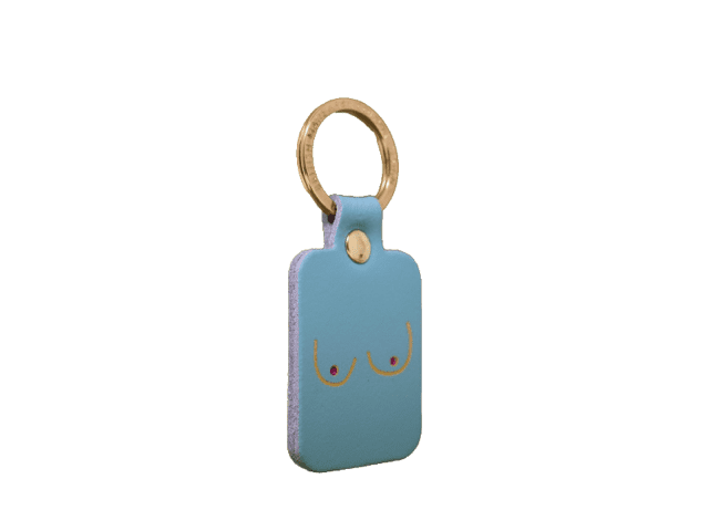 A rectangular black leather keyring with a gold keyring, featuring a minimalist line drawing of two breasts—Boob Key Ring - Black is perfect for anyone looking for unique or standout accessories whilst shopping in Tallinn. Gate21.ee