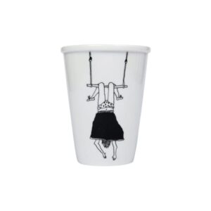 A white mug featuring a black and white illustration of a person hanging upside down from a trapeze, with their hair and arms dangling below—a unique piece inspired by Estonian design, perfect for Tallinn shopping or concept store enthusiasts. Gate21.ee