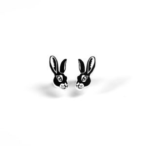 Two Siilid Kõrvarõngad earrings, featuring stylised black and white hedgehog head designs, are displayed on a white background—perfect for those seeking playful Estonian design ideas. Gate21.ee