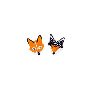 Two fox-shaped objects on a white background, crafted in Estonian design—one features a plain orange face, whilst the other sports black-and-white polka-dotted ears. Perfect for adding charm to any concept shop. Gate21.ee