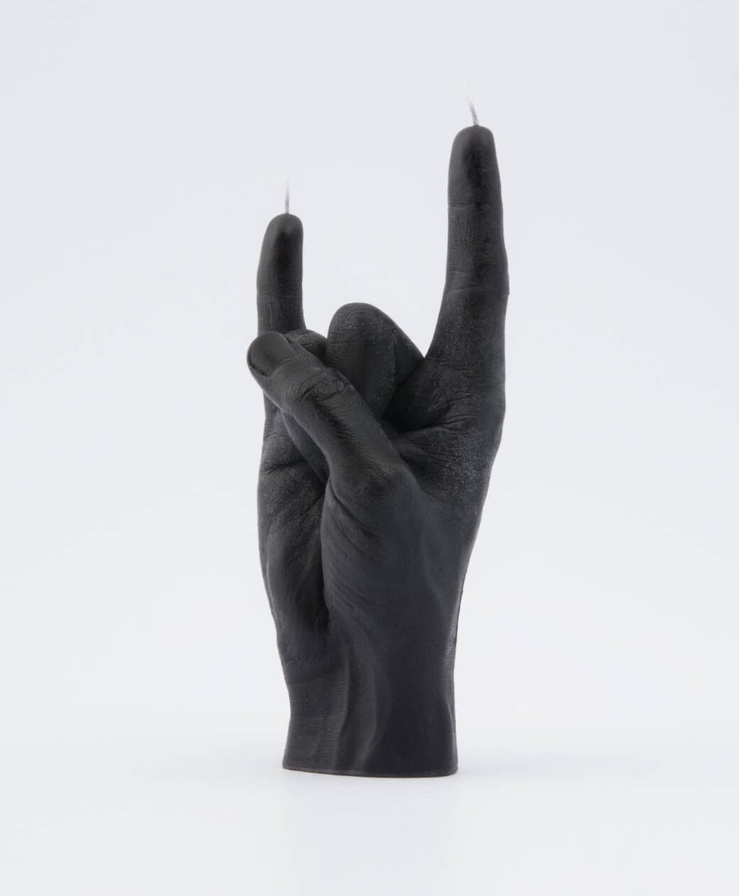 Let’s Rock – Black is a candle shaped like a hand making the rock on gesture, with two wicks on the raised fingers. This unique Estonian design stands out as a bold, giftable piece for concept stores or gift shops. Gate21.ee