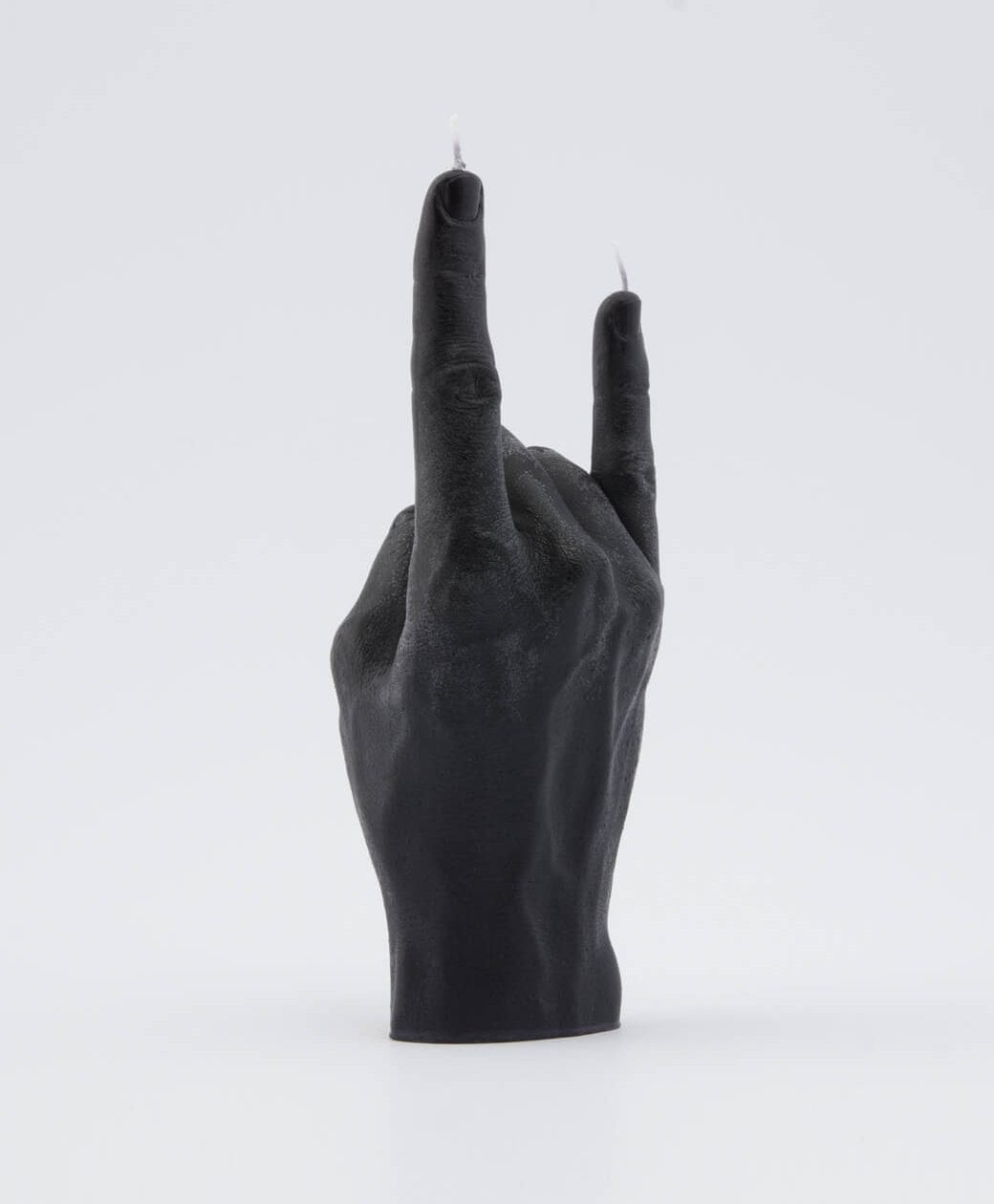 Let’s Rock - Black is a black candle shaped like a hand making the rock on gesture, featuring wicks at each fingertip—an ideal unique find for concept shops or gift shops, pictured on a plain white background. Gate21.ee