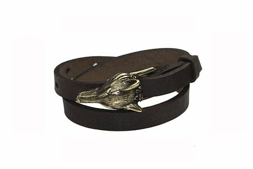 The ERER Wolf Bracelet - Silver is a dark brown leather wrap bracelet with a silver wolf head metal clasp. Its simple, rustic style and detailed finish make it an ideal, unique choice for any gift shop collection. Gate21.ee