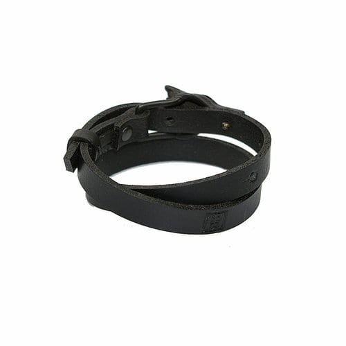 The ERER Wolf Bracelet - Silver is a black leather wrap bracelet with two adjustable straps and metal rivet details, inspired by Estonian design, shown coiled on a white background. Gate21.ee
