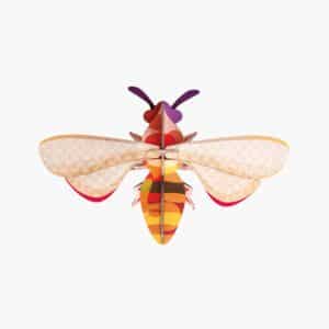 Honey Bee – a vibrant paper model featuring beige wings, a striped orange, red, and yellow body, and purple antennae. A unique find from Tallinn for creative gift ideas. Displayed on a white background. Gate21.ee