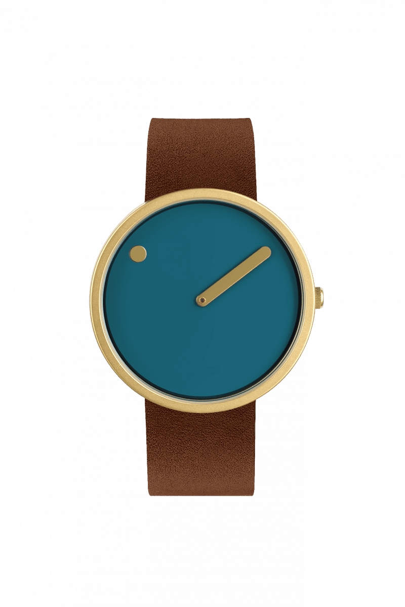 The Dusty Blue / Gold / 40mm is a minimalist wristwatch with a round gold case, teal face, single gold hand, and small gold dot. Estonian-designed, it features a plain brown leather strap and no numbers—ideal for concept shops or gift shops. Gate21.ee