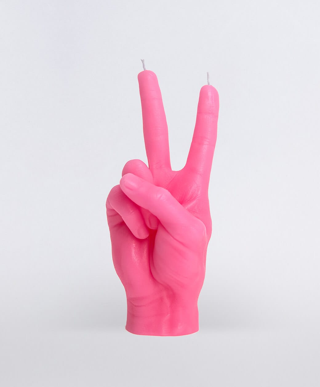 A curated blue candle shaped like a hand giving a peace sign, featuring two wicks at the fingertips—Peace Candle - Blue is perfect for those seeking unique gift ideas from Tallinn shopping. Gate21.ee