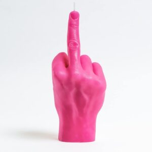 The F*ck You Candle - Pink is a bright pink candle shaped like a human hand with the middle finger raised, featuring Estonian design, displayed against a plain white background. Gate21.ee