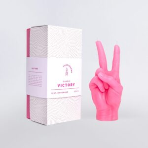 A blue candle shaped like a hand making a peace sign is shown beside a white and pink box labelled Peace Candle - Blue, which features a fingerprint-like pattern and product details—ideal for curated gift shop displays. Gate21.ee