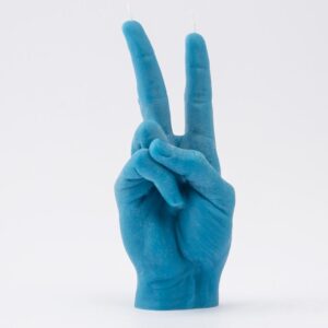 The Peace Candle - Blue features a blue candle shaped like a hand making the peace sign, with two unlit wicks on the raised fingers—a standout gift shop item for those seeking unique décor—displayed against a plain white background. Gate21.ee