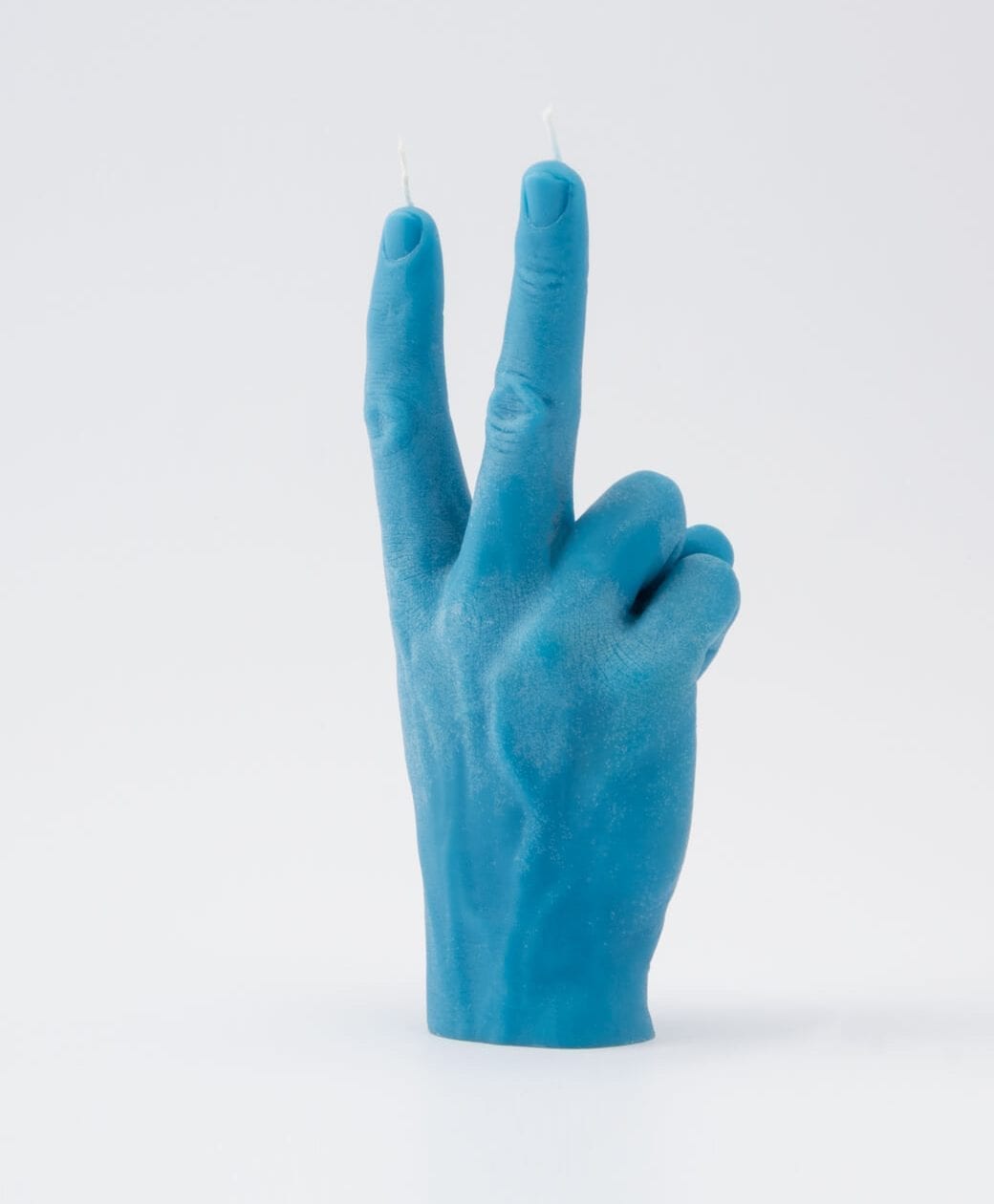 The Peace Candle - Blue is a human hand-shaped blue candle making a peace sign, with wicks on the index and middle fingers—an eye-catching addition for your concept shop, photographed against a plain white background. Gate21.ee