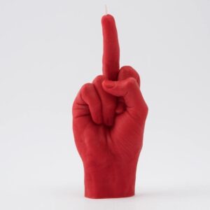 The F*ck You Candle - Red is a bold red candle shaped as a hand giving the middle finger, styled for Estonian design lovers and ideal for gift shop seekers wanting something unique. Gate21.ee