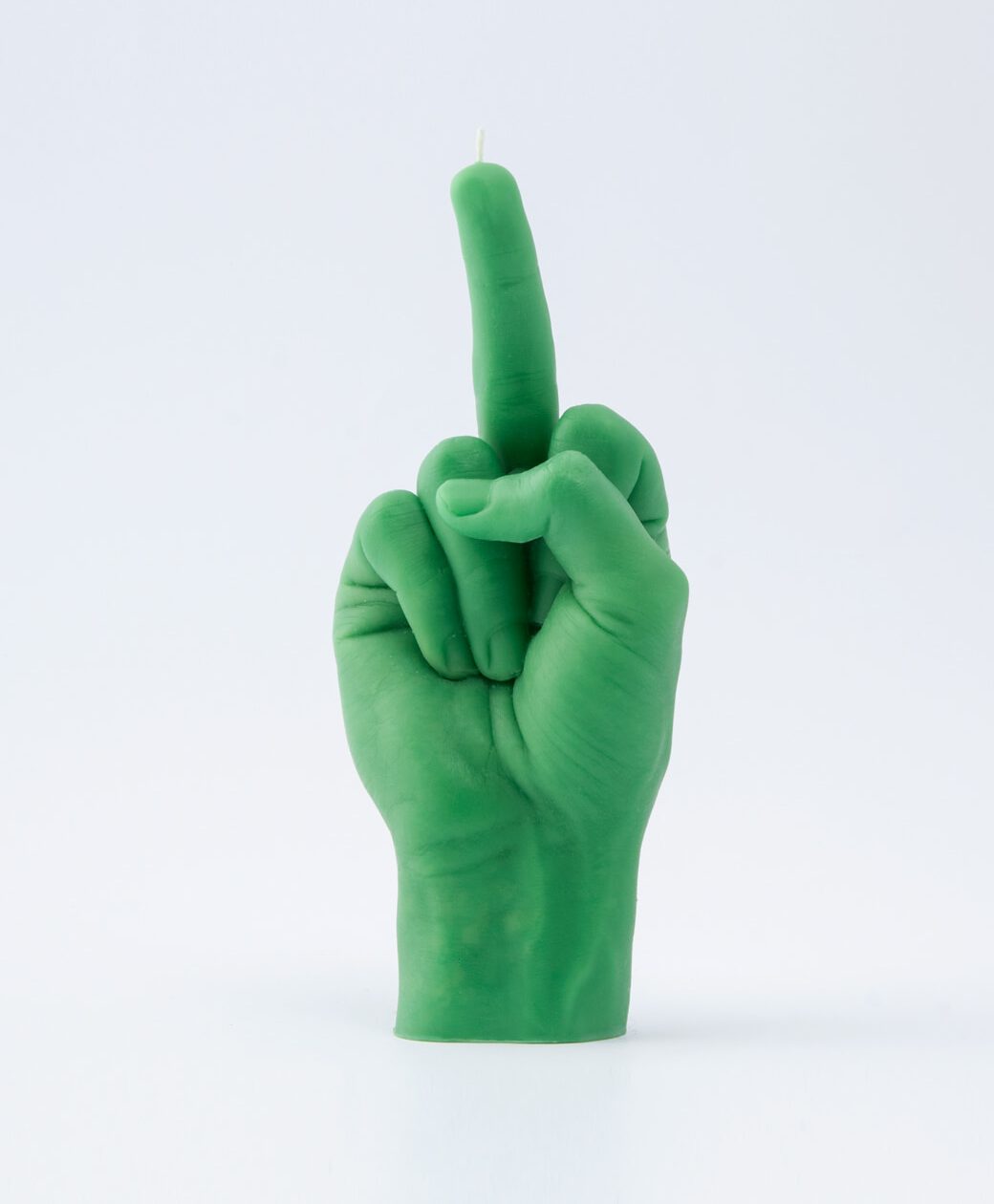 The F*ck You Candle - Green is a bold Estonian-designed candle shaped like a hand giving the middle finger—perfect for adding attitude to any concept shop or gift shop. Features a striking green colour and comes against a plain white background. Gate21.ee