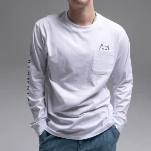 Wearing the Lord Nermal Pocket Long Sleeve in white with a cat face peeking from the front pocket and paired with blue jeans, this casual, playful look highlights curated Estonian design against a simple, light background. Gate21.ee
