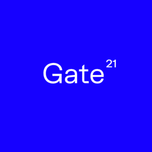 White text on a solid bright blue background reads Gate with a small superscript 21, resembling Gate²¹—an eye-catching nod to Estonian design, perfect for a Tallinn shopping or gift shop display. Gate21.ee
