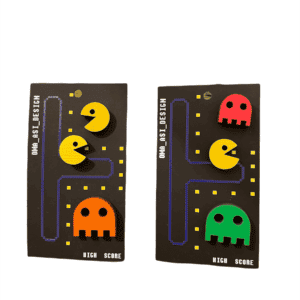 Two black rectangular Pac-Man Sets &ndash; K&Otilde;IK cards feature Estonian design with yellow dots, Pac-Man and ghost figures. Each reads OMA. ASI. DESIGN and HIGH SCORE&mdash;ideal for Tallinn shopping or unique gift ideas. Gate21.ee