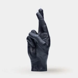 A purple candle shaped like a human hand showing the middle finger, with wicks at the fingertips. The F*ck You Candle is a bold Estonian design—an unforgettable Tallinn shopping find or unique present. Set against a plain, light background. Gate21.ee