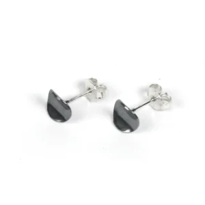 Kedrina small silver earrings by K&Otilde;IK - Realisation feature half-moon dark stones on silver posts with butterfly backs, displayed on white&mdash;ideal for adding a curated touch from your favourite Tallinn concept store. Gate21.ee