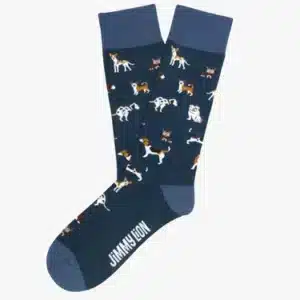 Dogs – Regular: Navy blue socks with assorted dog illustrations and JIMMY LION in white on the sole. Solid dark blue toes, heels, and cuffs—an original find for shoppers in Tallinn. Gate21.ee
