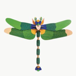 The Giant Green Dragonfly is a symmetrical, stylised model made from flat, interlocking green, blue, and beige pieces—showcasing unique Estonian design—displayed on a plain white background. Gate21.ee