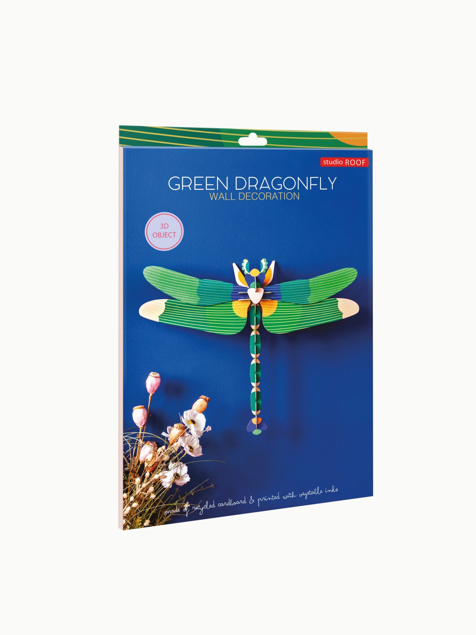 The packaging for the Giant Green Dragonfly 3D wall decoration is displayed upright against a white background—a vibrant dragonfly model is featured on the blue cover, making it an ideal Tallinn souvenir or a unique gift shop choice. Gate21.ee