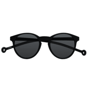 The "Isla" Black Sunglasses feature round frames, dark lenses, and straight arms, embodying contemporary Estonian design, displayed against a white background. Gate21.ee