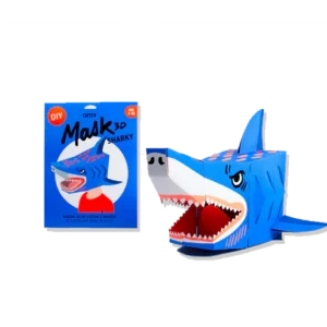A blue DIY Shark - 3D Mask made of cardboard with Estonian design is shown next to its box, which features an illustration and the name Shark - 3D Mask—ideal for creative gifts in any shop. Gate21.ee