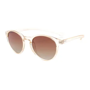 A pair of "Isla" Transparent Nude Sunglasses featuring round frames and brown gradient lenses, displayed from an angled side view on a white background. Gate21.ee