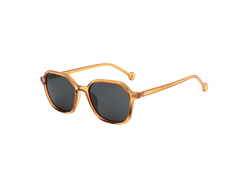 The "Valle" Caramel Sunglasses feature dark rectangular lenses and transparent amber-coloured frames—ideal for your next Tallinn shopping spree or as a chic pick from a local concept shop. Gate21.ee