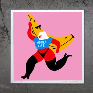 The "Adult Life - Giclée" features a stylised figure in red, black, and blue labelled ADULT LIFE, holding a banana on a pink backdrop. White-haired and mid-stride, it's ideal for those wanting unique art or Tallinn shopping inspiration. Gate21.ee