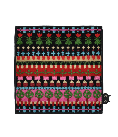 A curated square fabric piece featuring colourful, horizontal rows of floral and geometric patterns on a black background. A small cat face detail appears at the bottom right corner, perfect for those seeking unique ideas. Gate21.ee