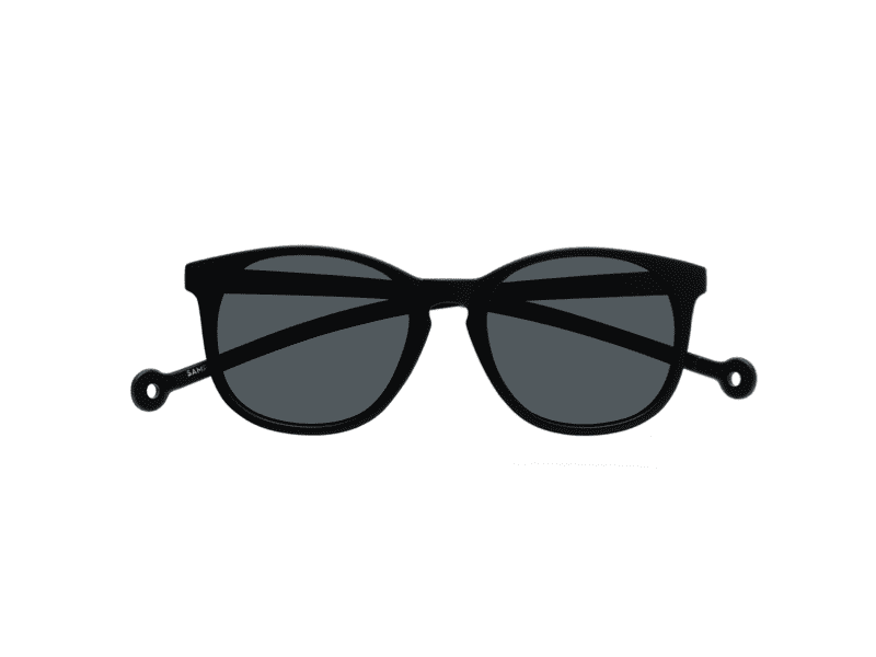 The "Arroyo" Black Sunglasses feature cat-eye frames and dark lenses, shown against a white background—an ideal accessory to enhance your Tallinn shopping experience. Gate21.ee