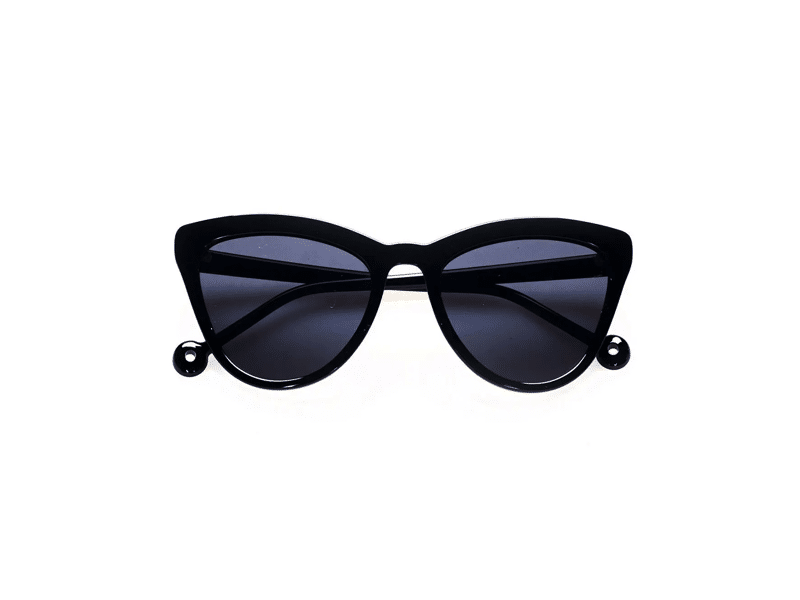 The "Colina" Black Sunglasses are cat-eye frames with dark tinted lenses and a glossy finish, shown against a white background. Their slight upward curve at the edges adds a unique touch for anyone seeking fresh style ideas. Gate21.ee