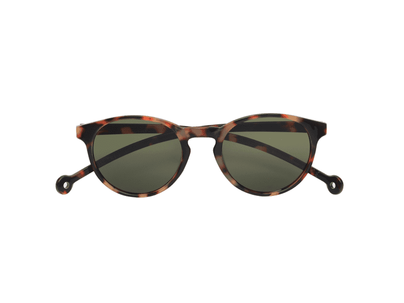 The "Isla" Tortoise Sunglasses feature round tortoiseshell frames and dark lenses, inspired by Estonian design, displayed against a plain white background. Gate21.ee