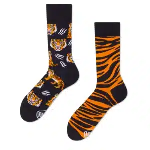 Feet of the Tiger is a mismatched sock pair inspired by Estonian design—one black with orange tigers and white scratch marks, the other with orange and black tiger stripes. A quirky gift from Tallinn or your local shop!. Gate21.ee