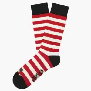 Grab the Wally - Regular: socks with red and white stripes, black heels/toes/cuffs, small text, and a cartoon near the toe—ideal for your next shopping trip in Tallinn. Gate21.ee