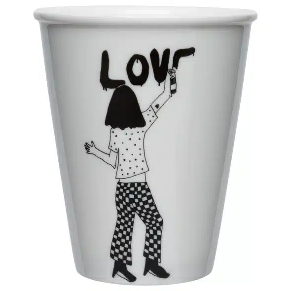The Thank you Cup is a white mug with a black and white illustration of a person in chequered trousers and polka-dot shirt spray-painting "LOVE"—a perfect gift shop item that showcases distinctive Estonian design. Gate21.ee