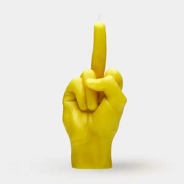 The F*ck You Candle - Yellow is a bold, hand-shaped candle with an extended middle finger and wick at the tip—an edgy accent for concept shops or a standout piece for unique shopping in Tallinn. Gate21.ee