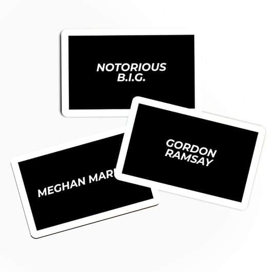 Three black F'ck Marry Kill - Card Game cards with white text—featuring names like “NOTORIOUS B.I.G.,” “GORDON RAMSAY,” and “MEGHAN MARKLE”—are arranged on a white surface, ideal for a concept shop display. Gate21.ee
