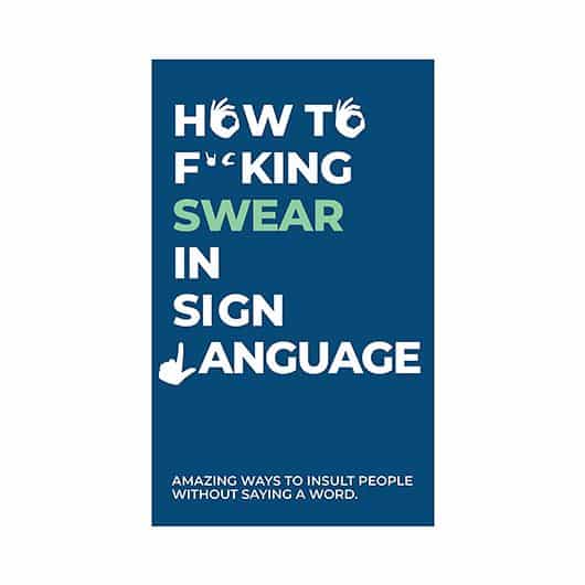 A blue card game box titled "How to Swear in Sign Language" in bold white and green text, featuring sign language hand symbols. Ideal for Tallinn shopping or quirky concept shops highlighting Estonian design. Gate21.ee