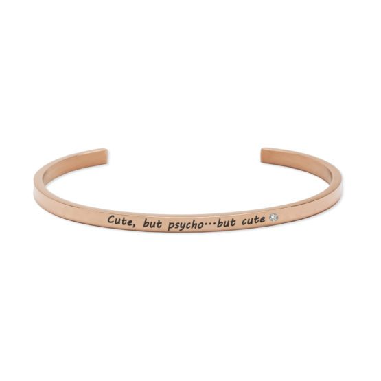 The "Cute, but psycho..but cute" rose gold open bangle features engraved text and a clear gemstone accent—an eye-catching piece for concept shops or your next Tallinn shopping adventure. Gate21.ee