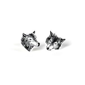 Hallid Hundid Kõrvarõngad: Stud earrings with black and white illustrated wolf heads, each showing a unique expression—an ideal quirky accessory for those who love creative finds from your favourite concept shop. Gate21.ee