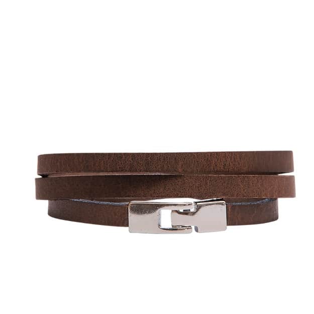 The ERER - Brown Triple Wrap Bracelet features three slim leather bands and a rectangular silver clasp—an ideal pick for a unique Tallinn shopping find. Shown on a white background. Gate21.ee