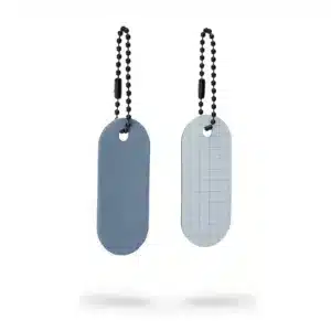 Discover the Reflective Tag - Metallic Silver: an oval-shaped keyring with a beaded chain, featuring sleek modern Estonian design—a stylish and practical accessory for your next Tallinn shopping or gift shop visit. Gate21.ee