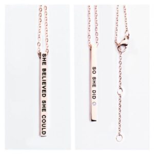 Two images of our "She believed She could / so She did" rose gold vertical bar necklace. Features engravings on each side, a lobster clasp, and an adjustable chain—an inspiring gift from our curated shop. Gate21.ee