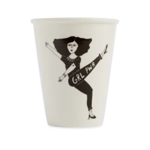 The Girl Power Cup is a white cup with a black and white illustration of a woman kicking and "GRL PWR" on her trousers. Designed in Estonia, it adds empowering style and uniqueness to any gift shop collection. Gate21.ee