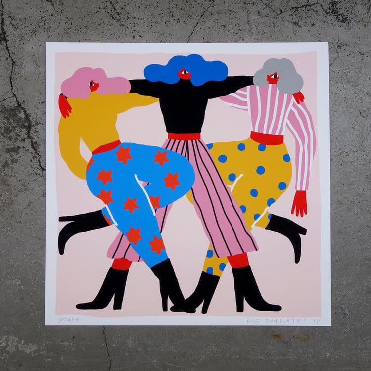 Illustration titled "Women - Giclée" features three stylised women arm-in-arm, dressed in vibrant clothes with stars, stripes, and polka dots—a unique artwork ideal as a memorable Tallinn shopping souvenir. Gate21.ee