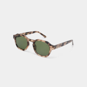 The ZAN - Havana sunglasses by A. Kj&aelig;rbede feature green lenses and a round, thick tortoiseshell-patterned frame, shown on a plain white background. Gate21.ee